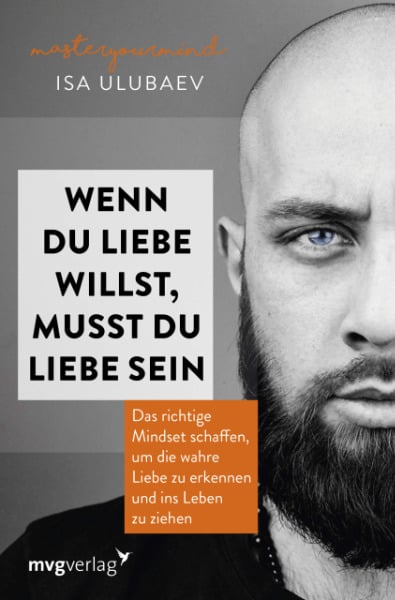 Buch Cover "Wenn du Liebe willst, musst du Liebe sein" veröffentlicht durch den mvg Verlag vom Autor Isa Ulubaev mit einem Foto von seinem Gesicht, dem Buchtitel und der Aufschrift "Das richtige Mindset schaffen, um die wahre Liebe zu erkennen und ins Leben zu ziehen"